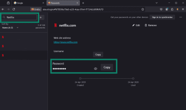 Mozilla Firefox password manager open with account search bar and specific account password both highlighted